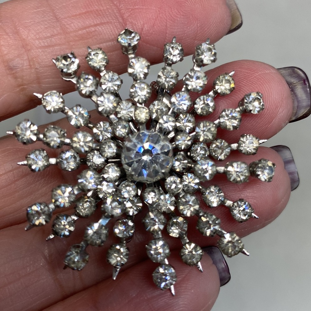 Beautiful vintage Coro starburst or snowflake pin